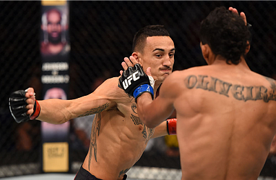  Charles Oliveira and Max Holloway